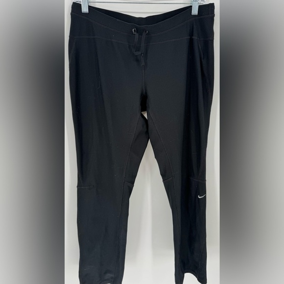 Nike Women's Dri-FIT Unlimited Zippered Cuff Versatile Pants - Picture 3 of 16
